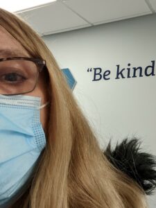 A woman wearing a mask